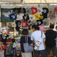 T-shirt vendor in the outer market.